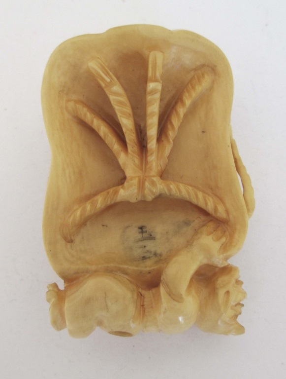 ELEPHANT IVORY JAPANESE NETSUKE A carved elephant Ivory netsuke. Approx 2 inches long. Signed. - Image 2 of 2