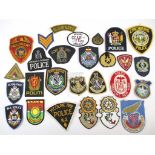 SELECTION OF CLOTH POLICE PATCHES World police badges including Mexico, Victoria, SA, Lynchburg,