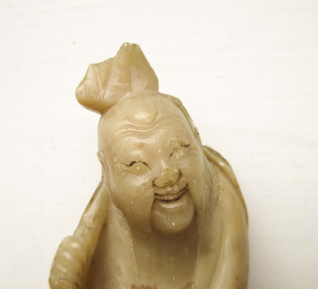 A carved God figure carrying a staff. Some wear and loses. Approx 5 inches tall. - Image 6 of 6