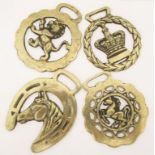 FOUR EARLY 20TH CENTURY HORSE BRASSES Horse harness brasses