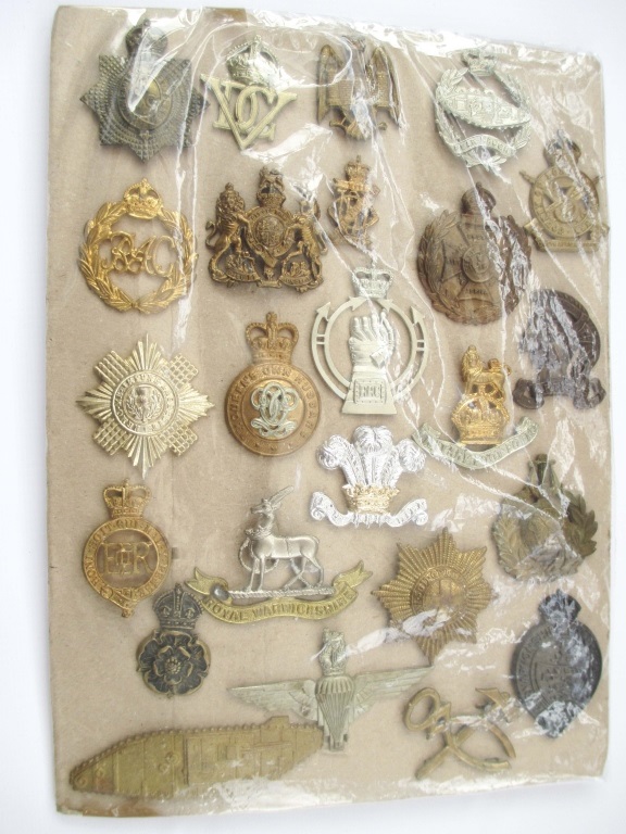 55 BRITISH ARMY BADGES A good mixed lot of cap and collar badges and sundry other items on two - Image 2 of 3