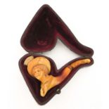 MEERSCHAUM PIPE meerschaum pipe, in the form of a Victorian lady. In it's original case. The amber