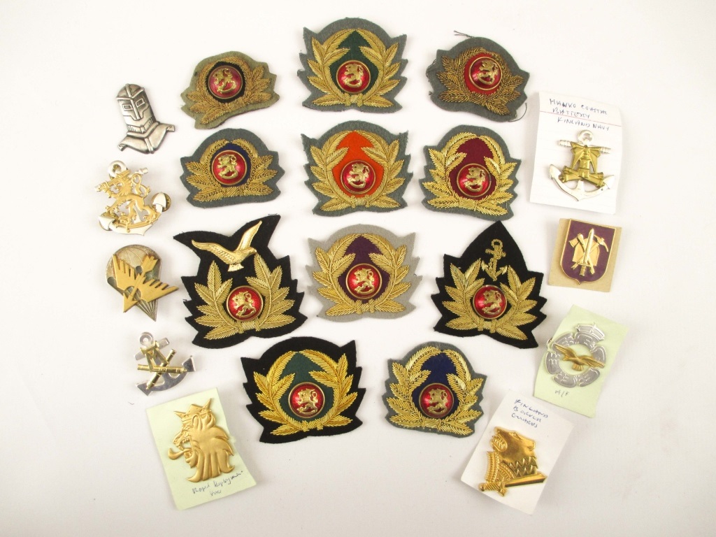 FINLAND - CAP INSIGNIA OF THE FINNISH ARMY, NAVY & AIR FORCE 20 cap badges