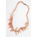 LADIES PINK CORAL NECKLACE A pink coral necklace of approx 17 inches.