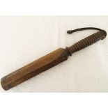 OCTAGONAL WOODEN POLICE TRUNCHEON Late Victorian wood baton of octagonal shape. Turned handle and