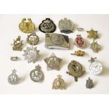 WORLD POLICE BADGES & A NZ BUCKLE A good and varied selection of World police badges, including