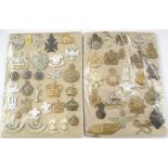 55 BRITISH ARMY BADGES A good mixed lot of cap and collar badges and sundry other items on two