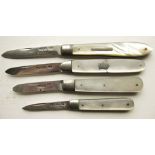 Four fruit knives, all with hallmarked sterling silver blades and mother of pearl handles. Overall