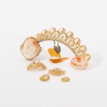 An antique gilt metal, gold and citrine parure and two shell cameos