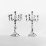 A pair of silver two-part, five-light candelabra