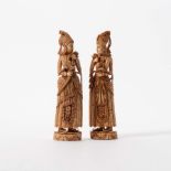 A pair of ivory figures