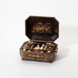 An octagonal Chinese lacquered box with ivory sewing implements
