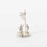 A miniature silver group of the Three Magi with star