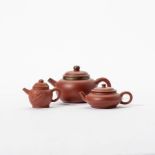 Three Yixing teapots with lids