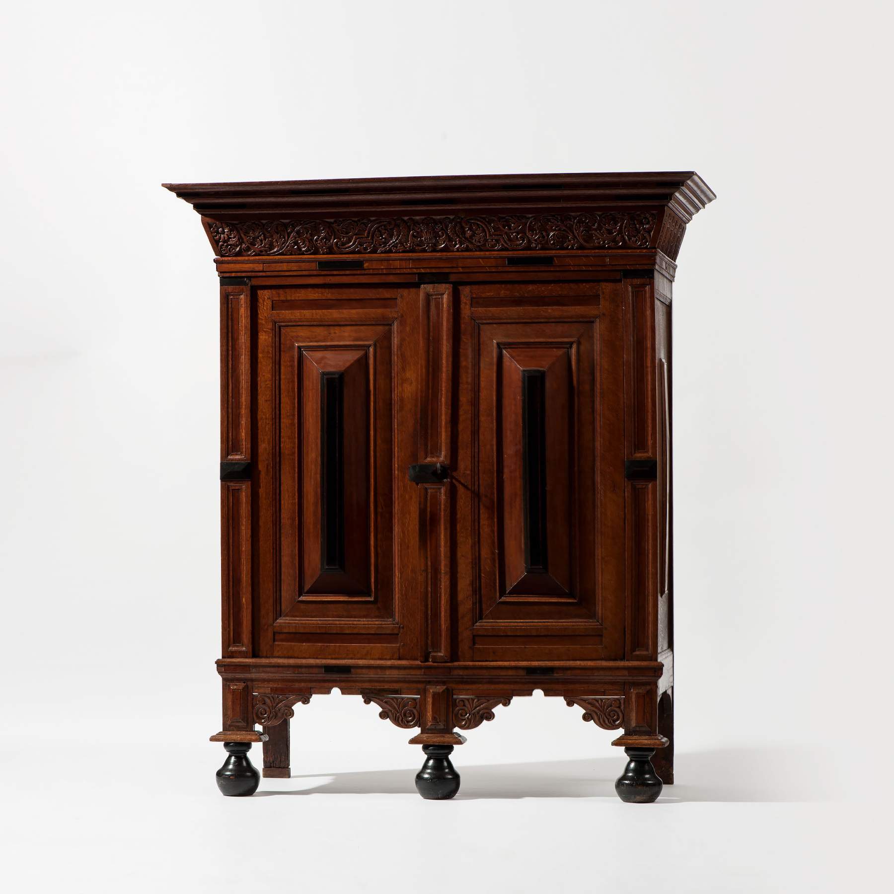 An oak and rosewood two-door 'kussenkast'