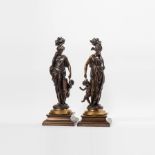 A pair of patinated and gilt bronze groups  Cast after a model by Albert Ernest Carrier-Belleuse (