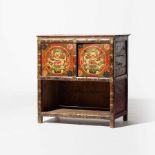 A polychrome wooden cabinet  Tibet, 18th/19th century The dismountable doors with a dragon motif