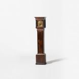A small model longcase clock  19th century Oak case, bronze dial with Roman numerals and openwork