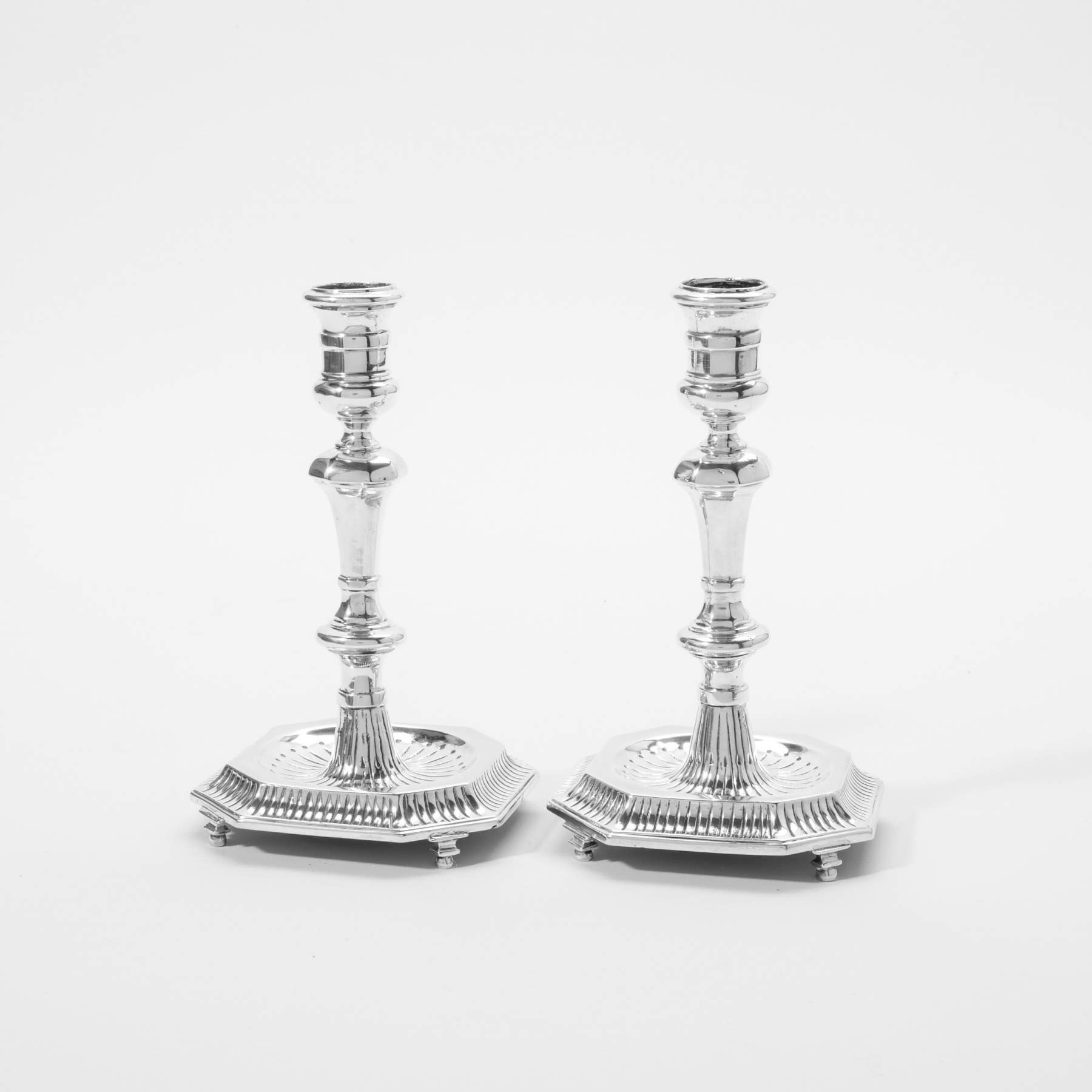 A pair of silver Marot-style candlesticks  Groningen, 1734/35, weduwe Berend Pootholt Base octagonal