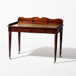 A mahogany Directoire writing table  France, circa 1800 The front with two central, lockable