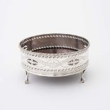 A silver George III bottle coaster London, 1780, Hester Bateman Openwork and engraved with a