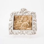 One carved rectangular ivory plaque in raised silver frame Silver Augsburg, 18th century, maker's