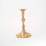 A gilt silver rococo candlestick Amsterdam, 1765, Nicolaas van Diemen The foot, shaft and candle
