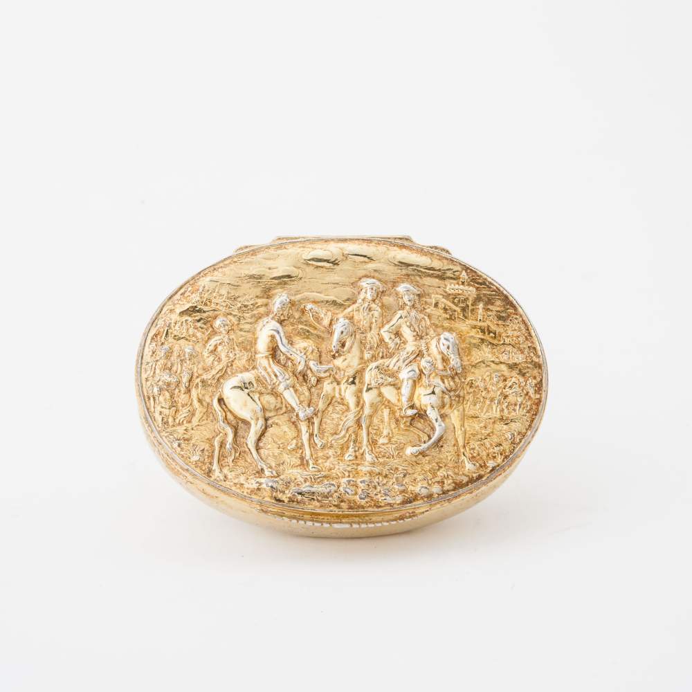 An oval gilt silver box Germany, circa 1730, 19th century hallmark The cast hinged lid with a