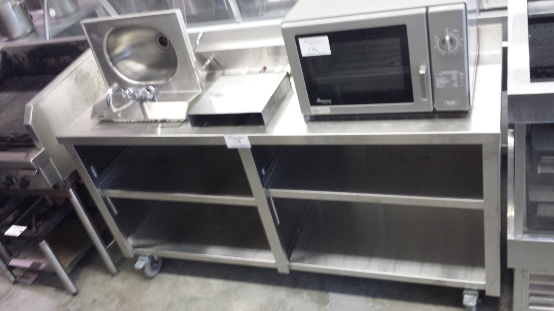 3 Tier Custom built 68 x 2" Stainless steel counter with back splash on casters