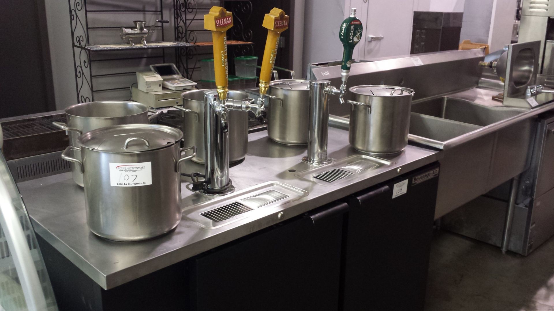 5 stainless steel pots with 4 lids