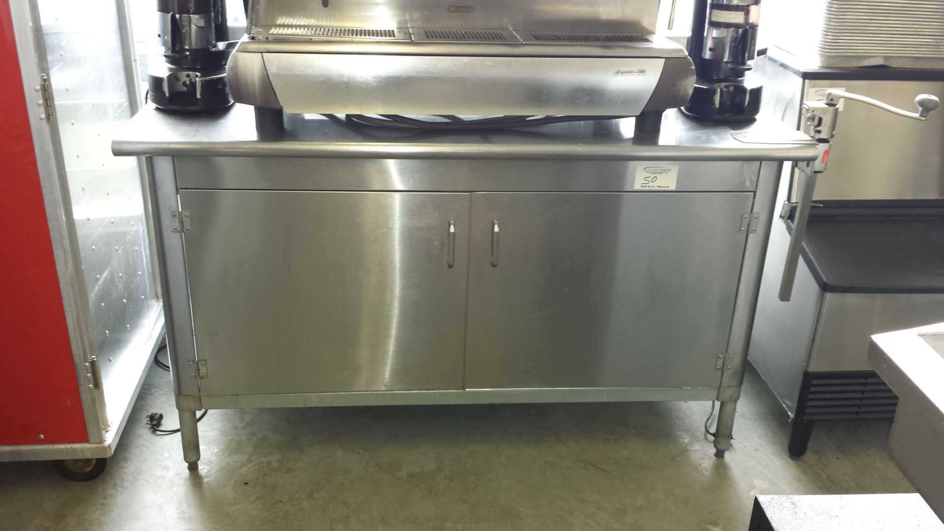 60 x 30" custom stainless steel table with backsplash, 2 doors and Edlund can opener