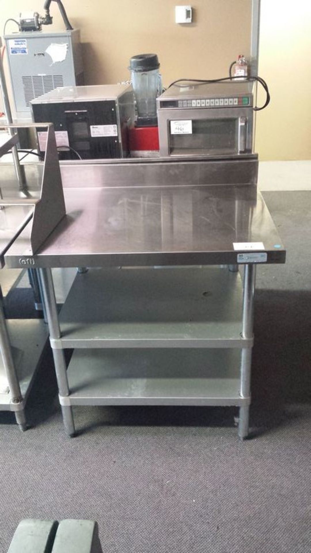 30 x 36" - 3 tier stainless steel work table with back splash