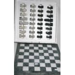 A marble chess set to include board and