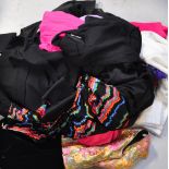 A quantity of ladies vintage clothing to include vintage dresses, jackets etc. CONDITION REPORT