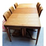 A Bramin teak dining table and six chair