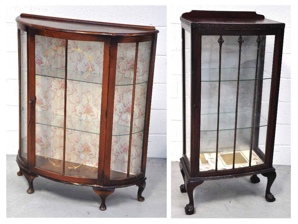 A 20th century wooden display cabinet wi