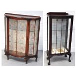 A 20th century wooden display cabinet wi