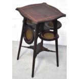 An Edwardian mahogany satinwood inlaid Art Nouveau design occasional table/cake stand, the