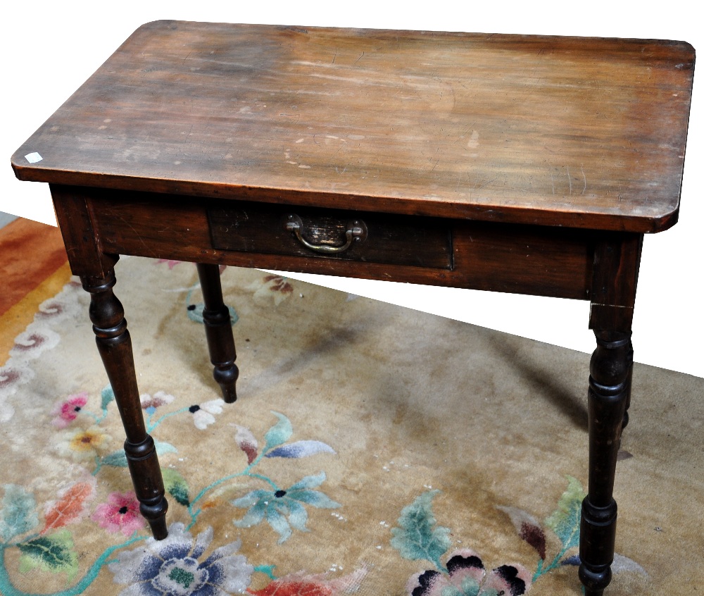 A single drawer walnut side table raised