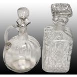 A 19th century glass claret jug and a cu