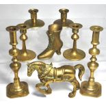 Three pairs of brass candlesticks, a bra