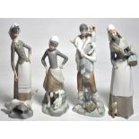 Four pieces of Lladro to include two girls with geese, a young lady with a puppy dog at her feet and