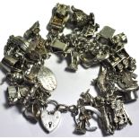 A hallmarked silver charm bracelet with