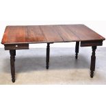 A c.1900 French oak extending dining tab