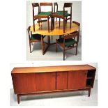 A 1970s oval drop leaf dining table, a s