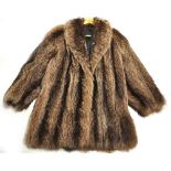 A vintage ladies silk lined three quarter length fur coat. CONDITION REPORT Size 18.