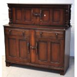 A 20th century Ercol style oak dresser/s