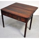 A mid 19th century oak fold over table w