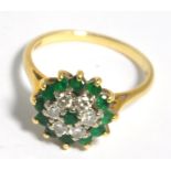 An 18ct gold emerald and diamond floral