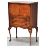 A reproduction walnut bureau, the twin c